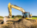 Excavator moves dirt ready to be replaced with sand from McBride Sands