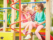 Kids play on brightly coloured school playground